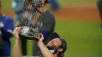 Clayton Kershaw lifts World Series trophy, quiets critics for now