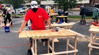 Coronavirus pandemic remote schooling surge spurs parents to make desks for kids in need