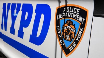 NYPD officer shot while struggling with suspect over gun