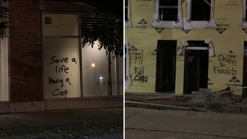 Seattle protesters arrested after explosive thrown at officers, buildings tagged with anti-cop graffiti