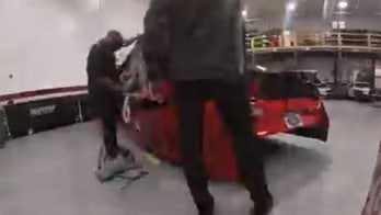 Time-lapse video shows how NASCAR cars get wrapped before a race