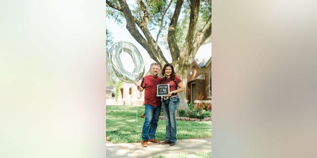 With the house to themselves after three decades, the parents went all-out for the lighthearted portrait session outside the family home in Pharr.