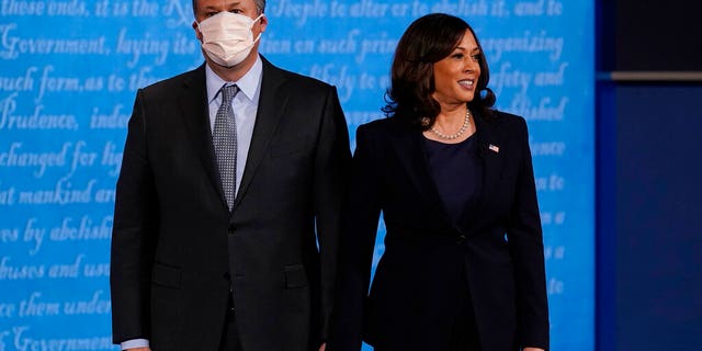 Democratic vice-presidential candidate Sen. Kamala Harris, D-Calif., stands with her husband Douglas Emhoff during the vice presidential debate.(AP Photo/Patrick Semansky)