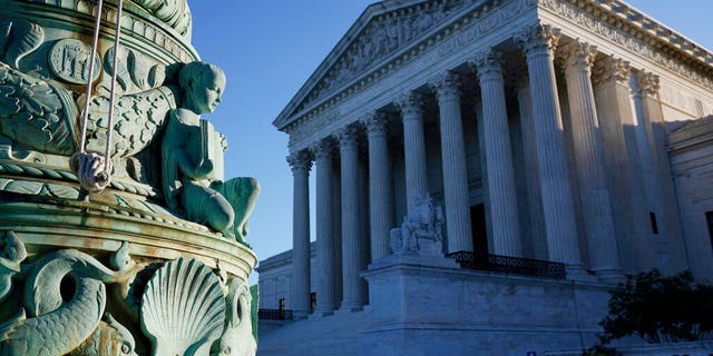 The Supreme Court is seen in Washington, Monday, Oct. 5, 2020, as the justices begin a new term following the recent death of their colleague, Ruth Bader Ginsburg.