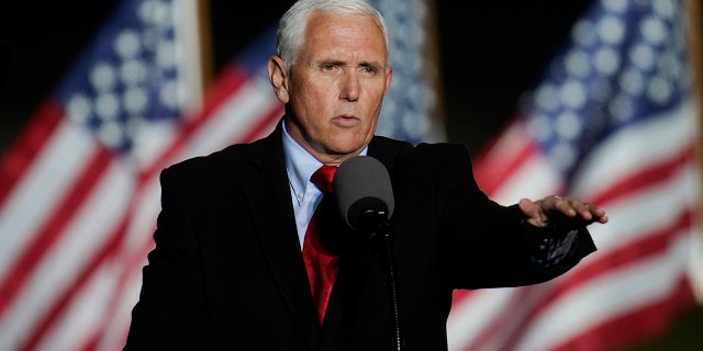 Vice President Mike Pence speaks at a campaign event, Wednesday, Oct. 28, 2020, in Flint, Mich. (AP Photo/Paul Sancya)