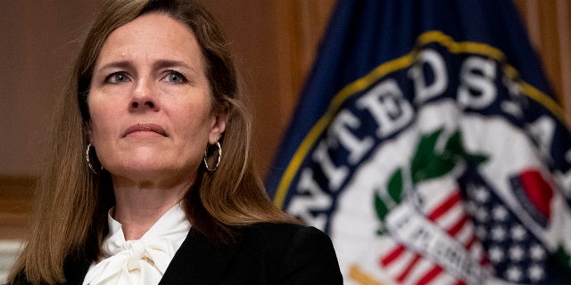 Supreme Court nominee Judge Amy Coney Barrett, meets with Sen. Joni Ernst, R-Iowa, not shown, Thursday, Oct. 1, 2020, at the Capitol in Washington. (Associated Press)