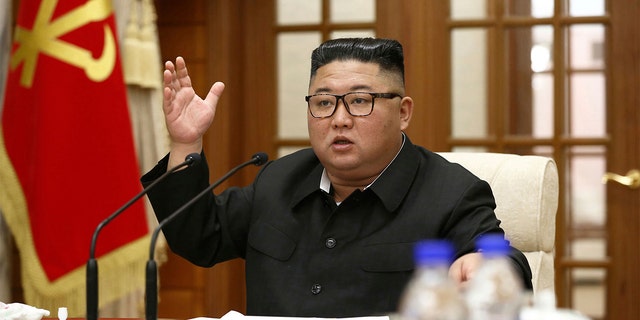 In this photo provided Wednesday, Sept. 30, 2020, by the North Korean government, North Korean leader Kim Jong Un attends the 18th meeting of Political Bureau of 7th Central Committee of the Workers' Party of Korea in Pyongyang, Tuesday, Sept. 29, 2020. (Korean Central News Agency/Korea News Service via AP)