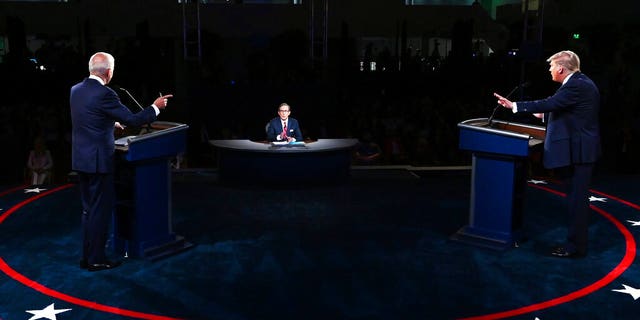 President Donald Trump and Democratic presidential candidate former Vice President Joe Biden participate in the first presidential debate Tuesday, Sept. 29, 2020, at Case Western University and Cleveland Clinic, in Cleveland. (Olivier Douliery/Pool vi AP)