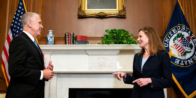Sen. Thom Tillis, R-N.C., meets with Judge Amy Coney Barrett, President Donald Trump's nominee to the Supreme Court, at the U.S. Capitol, Sept. 30, 2020, in Washington. (Associated Press)