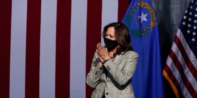 Democratic vice presidential candidate Sen. Kamala Harris, D-Calif., reacts after speaking at a drive-in campaign event Friday, Oct. 2, 2020, in Las Vegas. (AP Photo/John Locher)