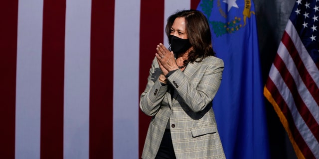 Democratic vice presidential candidate Sen. Kamala Harris, D-Calif., reacts after speaking at a drive-in campaign event Friday, Oct. 2, 2020, in Las Vegas. (AP Photo/John Locher)