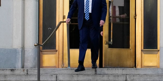 President Trump walks out of Walter Reed National Military Medical Center to return to the White House after receiving treatments for COVID-19 on Monday, Oct. 5, 2020, in Bethesda, Md. (AP Photo/Evan Vucci)