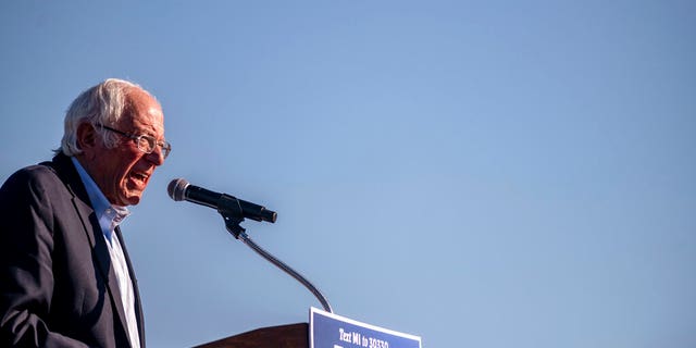 Sen. Bernie Sanders speaks to the crowd at a car rally campaign event for Democratic presidential candidate former Vice President Joe Biden on Monday, Oct. 5, 2020, in Warren, Mich.
