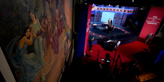 A large painting is seen in the auditorium at Kingsbury Hall as preparations take place for the vice presidential debate at the University of Utah, Tuesday, Oct. 6, 2020, in Salt Lake City. The vice presidential debate between Vice President Mike Pence and Democratic vice presidential candidate, Sen. Kamala Harris, D-Calif., is scheduled for Oct. 7. (AP Photo/Julio Cortez)