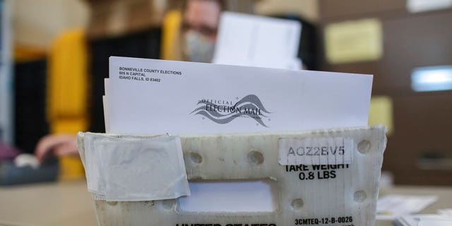 Mail-in election ballots are prepared at the Bonneville County Elections Office in Idaho Falls, Idaho on Tuesday, Oct. 6, 2020.