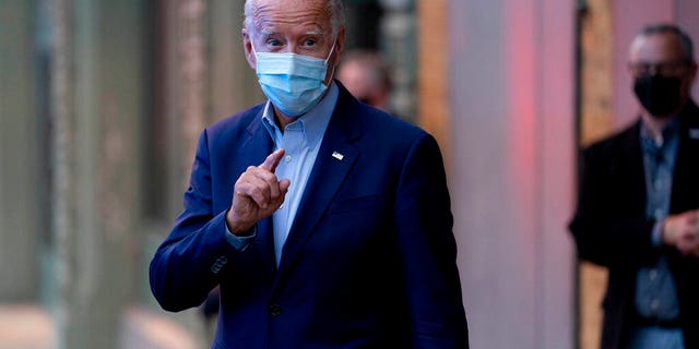 Democratic presidential candidate former Vice President Joe Biden speaks to members of the media as he leaves the Queen Theater in Wilmington, Del., Wednesday, Oct. 7, 2020. (AP Photo/Andrew Harnik)
