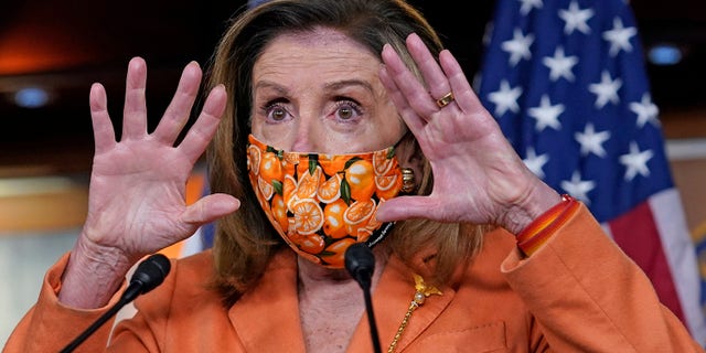 Speaker of the House Nancy Pelosi, D-Calif., meets with reporters at the Capitol in Washington, Thursday, Oct. 8, 2020. (AP Photo/J. Scott Applewhite)