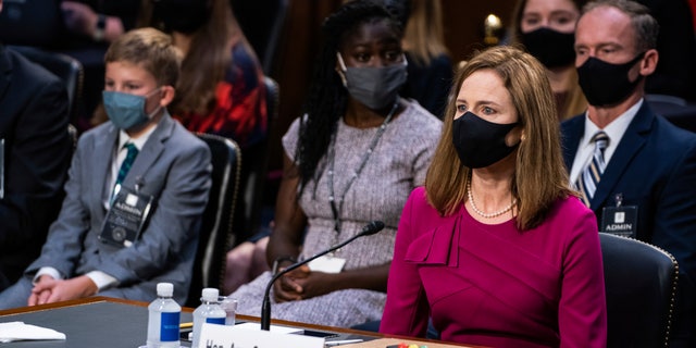 Supreme Court nominee Amy Coney Barrett listens during her Senate Judiciary Committee confirmation hearing on Capitol Hill in Washington, Monday, Oct. 12, 2020. (Demetrius Freeman/The Washington Post via AP, Pool)