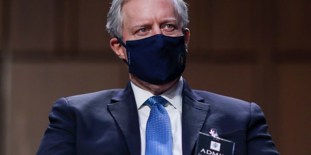 White House chief of staff Mark Meadows listens to questioning of Supreme Court nominee Amy Coney Barrett during her confirmation hearing before the Senate Judiciary Committee on Capitol Hill in Washington, Tuesday, Oct. 13, 2020. (Leah Millis/Pool via AP)