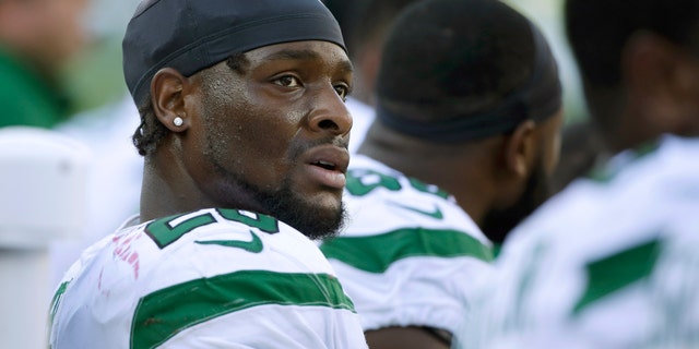 This Sept. 22, 2020, file photo shows former New York Jets running back Le'Veon Bell watching from the sideline near the end of the second half of an NFL football game against the New England Patriots, in Foxborough, Mass. (AP Photo/Steven Senne, File)