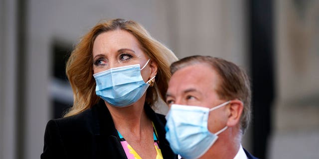 Mark and Patricia McCloskey leave following a court hearing in St. Louis, Oct. 14, 2020. (Associated Press)