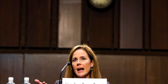 Supreme Court nominee Amy Coney Barrett speaks during a confirmation hearing before the Senate Judiciary Committee, Wednesday, Oct. 14, 2020, on Capitol Hill in Washington. (Demetrius Freeman/The Washington Post via AP, Pool)