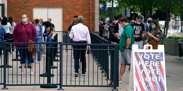 Clawing back votes: 7 states allow voters to resubmit ballots 2 Voters line up and wait to cast a ballot at the American Airlines Center during early voting Thursday, Oct. 15, 2020, in Dallas. (AP Photo/LM Otero)