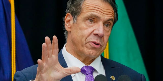 In this Oct. 12, 2020 photo, New York Gov. Andrew Cuomo speaks during a ceremony unveiling a statue of Mother Frances Cabrini, the patron saint of immigrants, in Battery Park in New York. (AP Photo/Frank Franklin II, File)