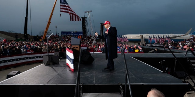 President Trump reacts after speaking during a campaign rally at Muskegon County Airport, Saturday, Oct. 17, 2020, in Norton Shores, Mich. (AP Photo/Alex Brandon)