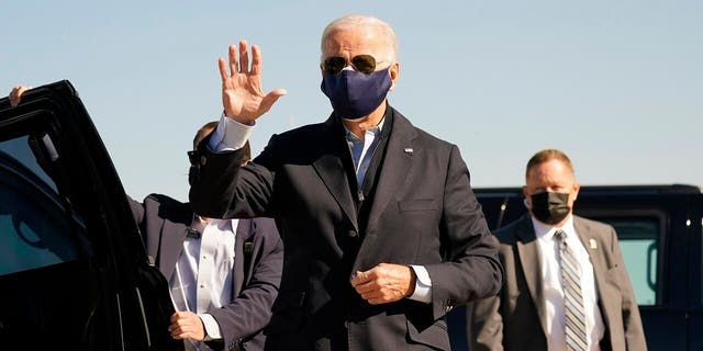 Democratic presidential candidate former Vice President Joe Biden arrives to board his campaign plane at the New Castle Airport in New Castle, Del., Sunday, Oct. 18, 2020, en route to Durham, N.C. (Associated Press)
