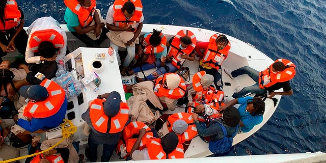 This photo provided by Carnival Cruise Line shows people after being rescued by a Carnival Cruise Line ship off the Florida coast, the cruise line reported Saturday, Oct. 17, 2020. (Carnival Cruise Line via AP)