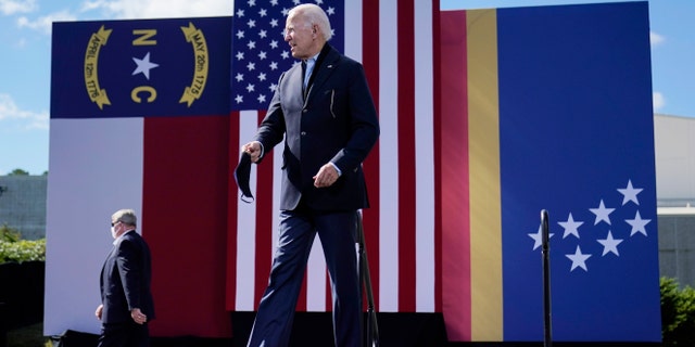 Democratic presidential candidate former Vice President Joe Biden arrives to speak during a campaign event at Riverside High School in Durham, N.C., Sunday, Oct. 18, 2020. (AP Photo/Carolyn Kaster)