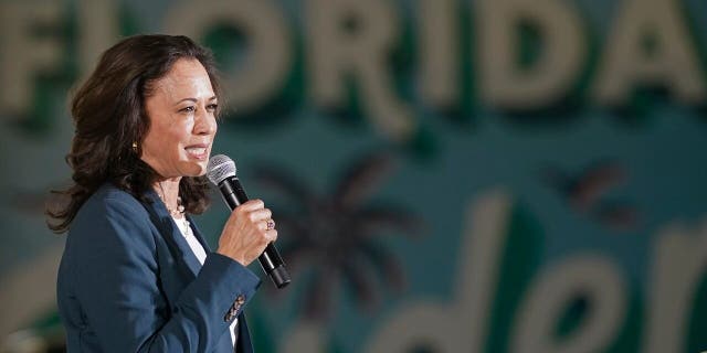 Democratic vice presidential candidate Sen. Kamala Harris, D-Calif., speaks to supporters at a campaign event Monday, Oct. 19, 2020, in Orlando, Fla. (AP Photo/John Raoux)