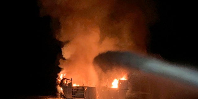 In this Sept. 2, 2019, file photo provided by the Ventura County Fire Department, VCFD firefighters respond to a fire aboard the Conception dive boat fire in the Santa Barbara Channel off the coast of Southern California. (Ventura County Fire Department via AP)