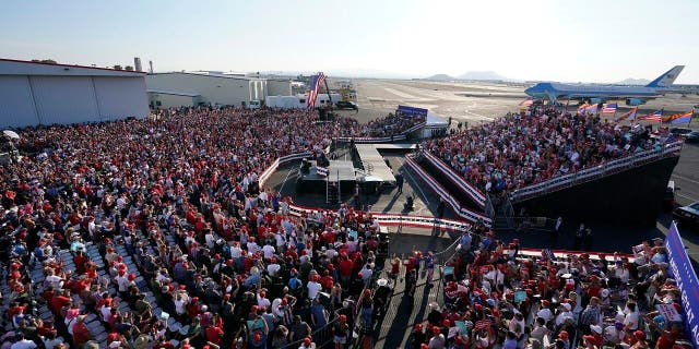 President Donald Trump speaks at a campaign rally at Tucson International Airport, Monday, Oct. 19, 2020, in Tucson, Ariz. (AP Photo/Alex Brandon)