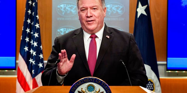 Secretary of State Mike Pompeo speaks during a news conference at the State Department in Washington, Wednesday, Oct. 21, 2020.