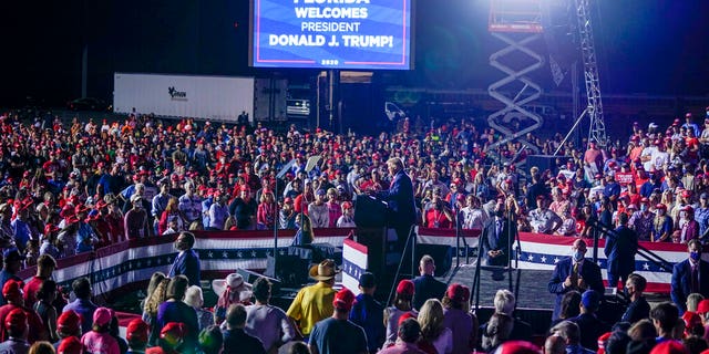 President Donald Trump speaks during a campaign rally at Pensacola International Airport, Friday, Oct. 23, 2020, in Pensacola, Fla. (AP Photo/Evan Vucci)
