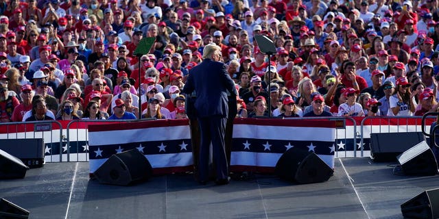 President Donald Trump speaks during a campaign rally at The Villages Polo Club, Friday, Oct. 23, 2020, in The Villages, Fla. (AP Photo/Evan Vucci)