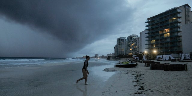 Clouds gather over Playa Gaviota Azul as Tropical Storm Zeta approaches Cancun, Mexico, Monday, Oct. A strengthening Tropical Storm Zeta is expected to become a hurricane Monday as it heads toward the eastern end of Mexico's resort-dotted Yucatan Peninsula and then likely move on for a possible landfall on the central U.S. Gulf Coast at midweek. (AP Photo/Victor Ruiz Garcia)