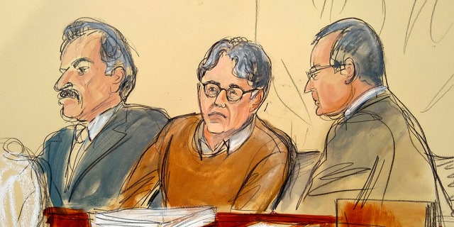 FILE - In this Tuesday, May 7, 2019, file courtroom drawing, defendant Keith Raniere, center, leader of the secretive group NXIVM, is seated between his attorneys Paul DerOhannesian, left, and Marc Agnifilo during the first day of his sex trafficking trial. (Elizabeth Williams via AP, File)
