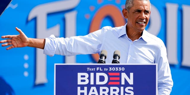 Former President Barack Obama speaks at a rally as he campaigns for Democratic presidential candidate former Vice President Joe Biden Tuesday, Oct. 27, 2020, in Orlando, Fla. (AP Photo/John Raoux)