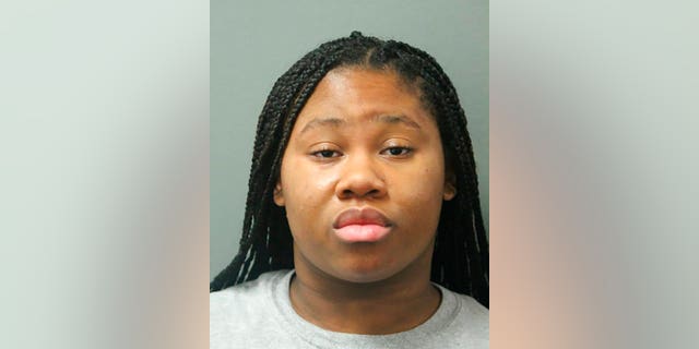 This booking photo released by the Chicago Police Department shows Jayla Hill, 18, one of two sisters accused of stabbing a West Side Chicago store security guard 27 times with a knife after he asked them to wear face masks and use hand sanitizer on Oct. 25. They were ordered held without bond on Oct. 27. (Chicago Police Department via AP)