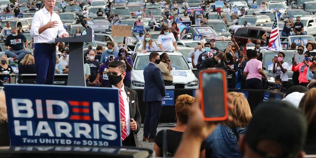 Democratic presidential candidate Joe Biden speaks at his drive-in rally at an amphitheater Tuesday, Oct 27, 2020, in Atlanta. (Curtis Compton/Atlanta Journal-Constitution via AP)