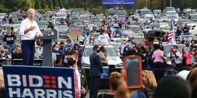 Democratic presidential candidate Joe Biden speaks at his drive-in rally at an amphitheater Tuesday, Oct 27, 2020, in Atlanta. (Curtis Compton/Atlanta Journal-Constitution via AP)