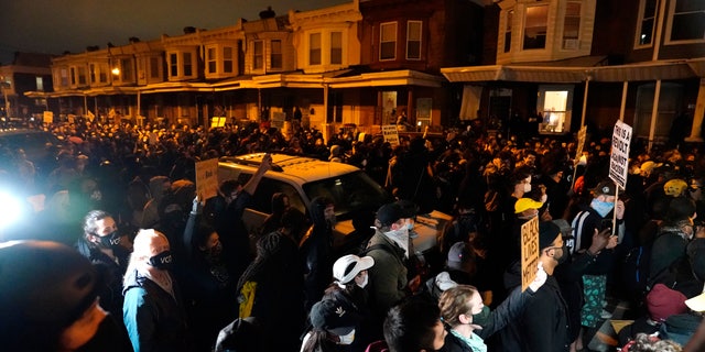  Protesters confront police during a march Oct. 27, in Philadelphia.  (AP Photo/Matt Slocum)
