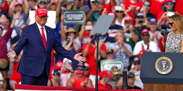 President Donald Trump gestures as he is introduced by first lady Melania Trump during a campaign rally Thursday, Oct. 29, 2020, in Tampa, Fla. (AP Photo/Chris O'Meara)