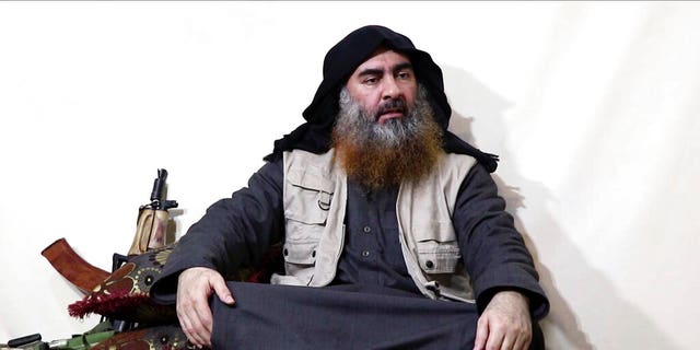 This file image made from video posted on a militant website April 29, 2019, purports to show the leader of the Islamic State group, Abu Bakr al-Baghdadi, being interviewed by his group's Al-Furqan media outlet. (Al-Furqan media via AP)