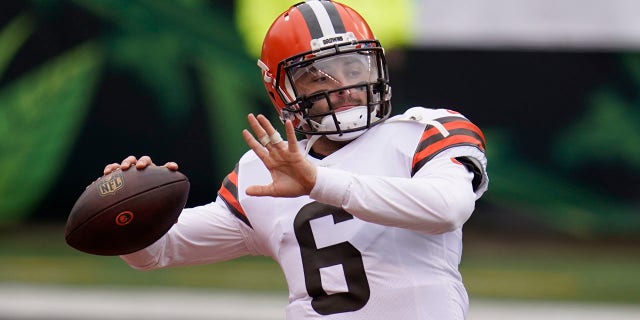 Cleveland Browns quarterback Baker Mayfield throws before an NFL football game against the Cincinnati Bengals, Sunday, Oct. 25, 2020, in Cincinnati. (AP Photo/Michael Conroy)