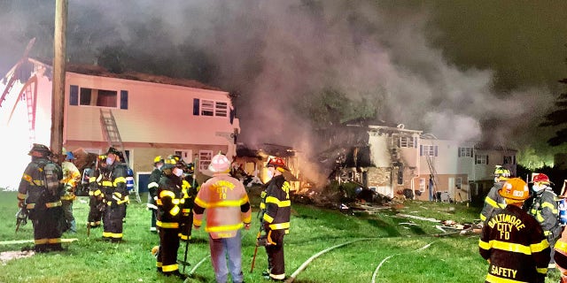 Baltimore Fire said the fire Sunday night involved five row homes.