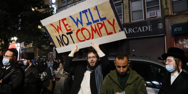 Groups of protesters gather in the Brooklyn neighborhood of Borough Park to denounce lockdowns of their neighborhood due to a spike in COVID-19 cases on October 07, 2020 in New York City.